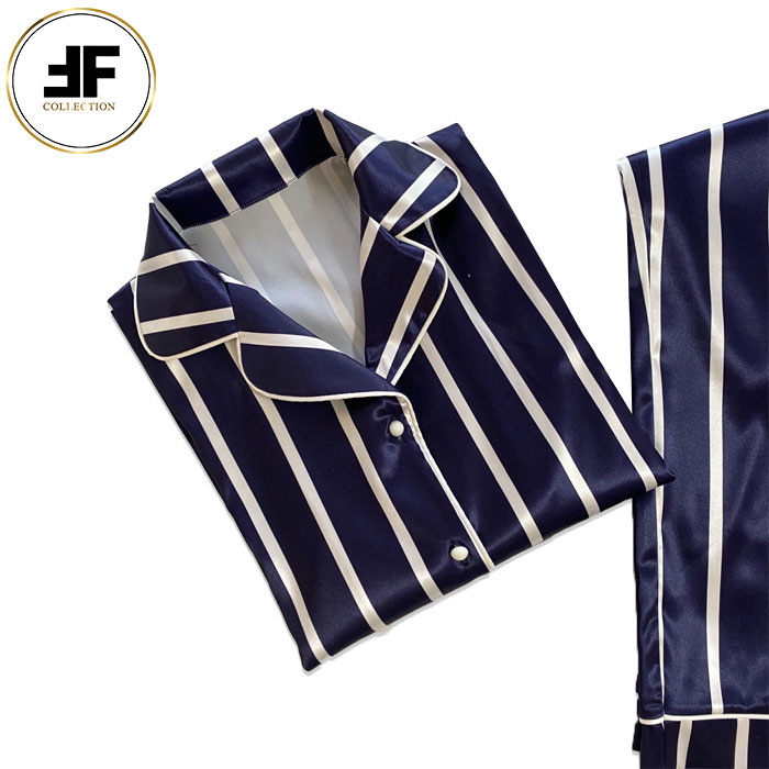 لباس خواب زنانه ست بلوز و شلوار طرح خط دار سورمه ای لباس خواب زنانه ست بلوز و شلوار طرح خط دار سورمه ای