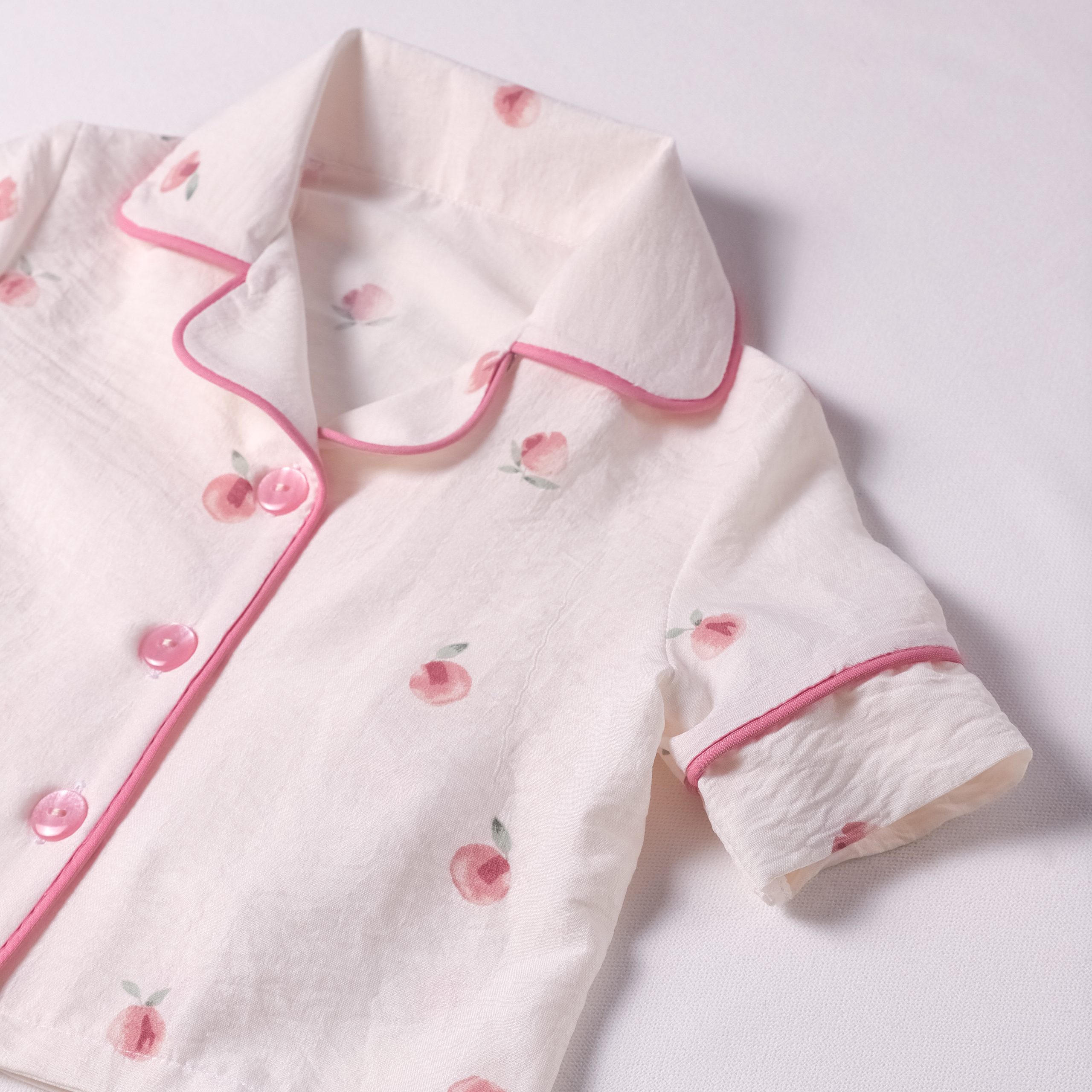 ست بلوز شلوار کودک جنس نخی طرح هلو ست بلوز شلوار کودک جنس نخی طرح هلو